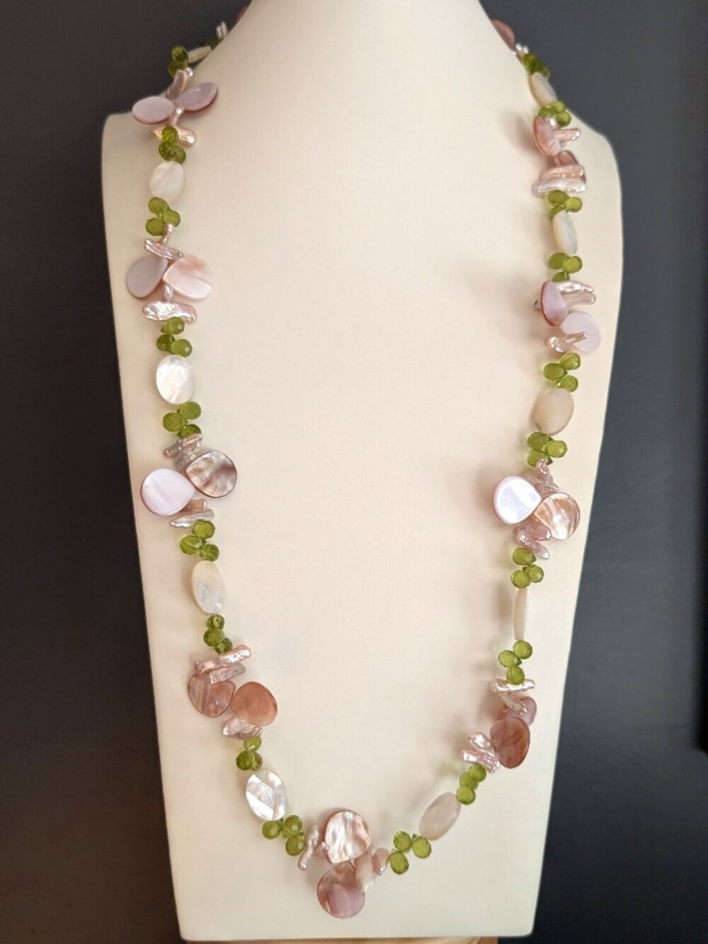 Polished various shell and green faceted crystal necklace